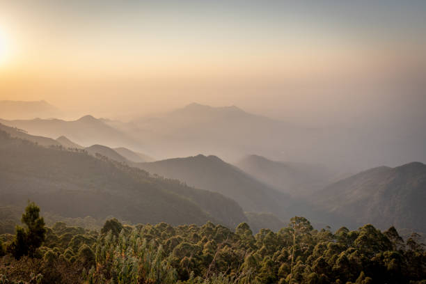 istock Sunrise view of Hill Range in orange rays 1156507201