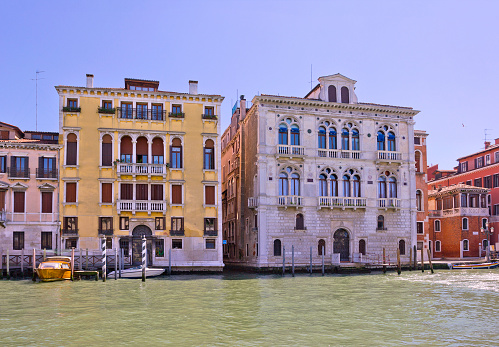 Venice, Italy – April 27, 2019: Cityscape with old buildings on the Grand canal
