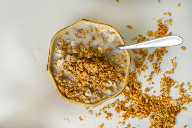 istock bowl of granola cereal in milk 1156514967