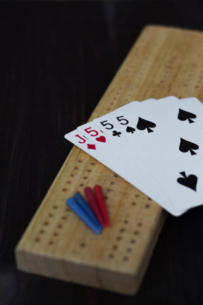 istock game of cribbage on black background 1156517104