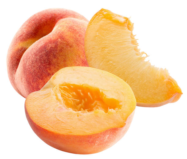 istock peach with slices isolated on a white background 1156517326