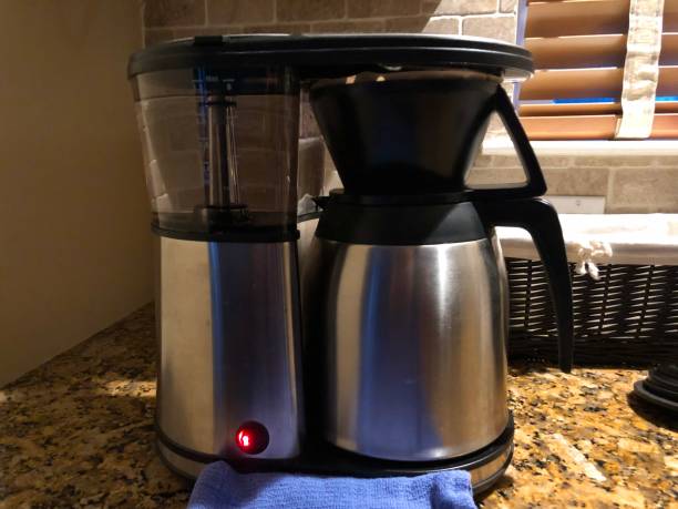 istock Making morning coffee in coffee pot - coffee filter 1156519377