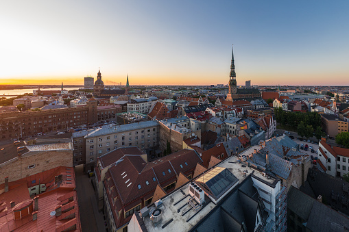 Aerial panoramic view of city Riga, Latvia during colourful sunset