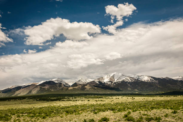 istock Meadow and snow mountain top 1156523742