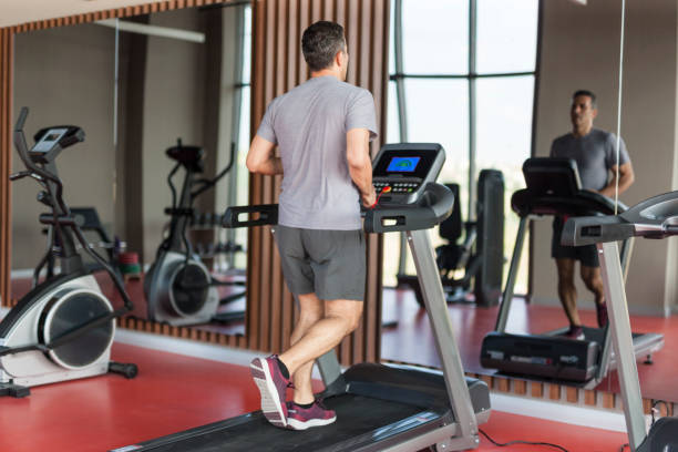 istock Man man running on the treadmill 1156523745
