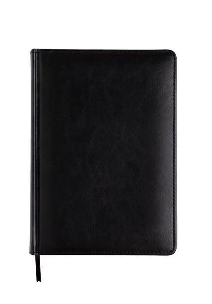 白い背景にノートブック。白い背景に隔離された黒いメモ帳。 - book black isolated on white note pad ストックフォトと画像