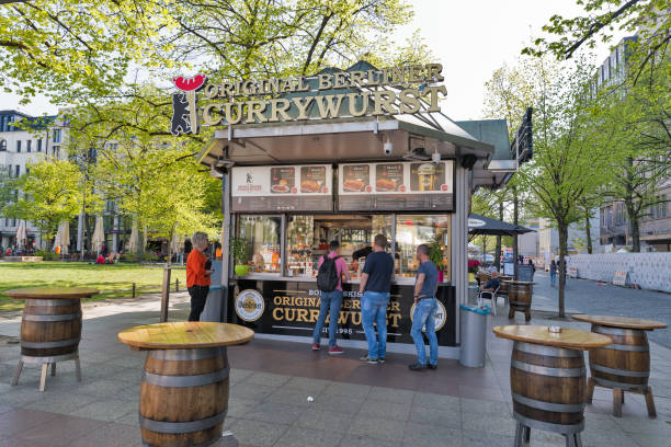 original berliner currywurst outdoor cafe, germany - currywurst stock-fotos und bilder