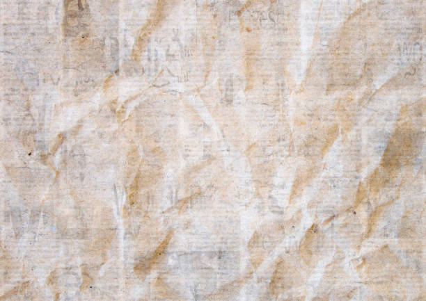istock Vintage grunge newspaper paper texture background. Blurred old crumpled newspapers backdrop 1156527703