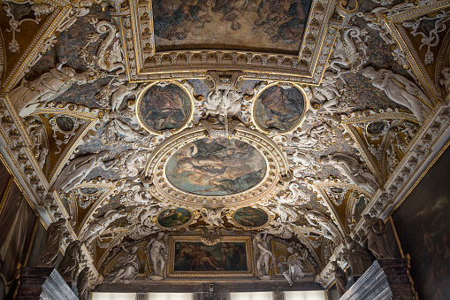 Italy, Venice. Doge's Palace, ceiling in the Atrium\n (The Square Atrium) is decorated with stucco and frescoes made by Veronese, Tintoretto and Bassano.