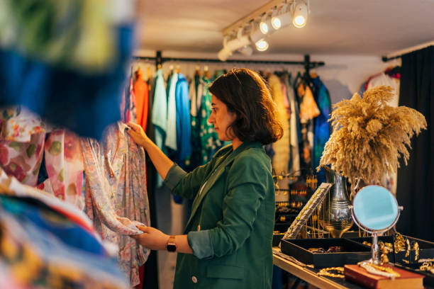 istock Woman Shopping in Second Hand Marketplace 1156530992