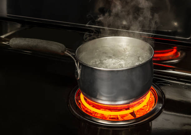 istock Boiling Pot of Water on Stove With Copy Space 1156531101