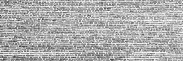 istock Brick wall, wide panorama of masonry. Wall with small Bricks 1156537787