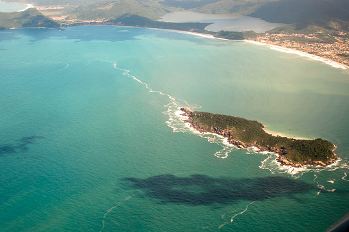 aerial view of sea and rocks on beach in Santa Catarina State, south of Brazil