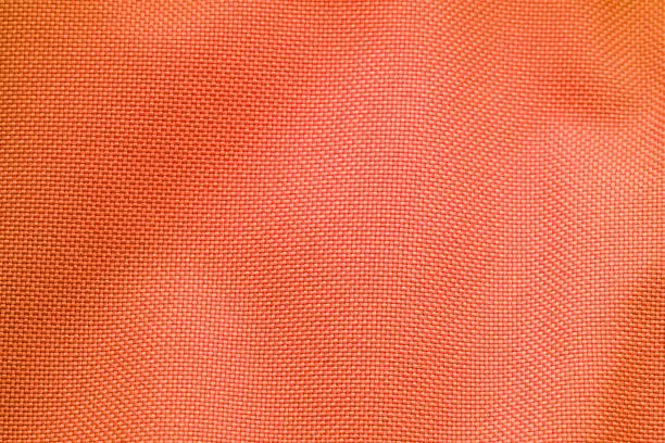 Orange Nylon Fabric Texture Background. Thick Fabric for Backpacks and Sports Equipment