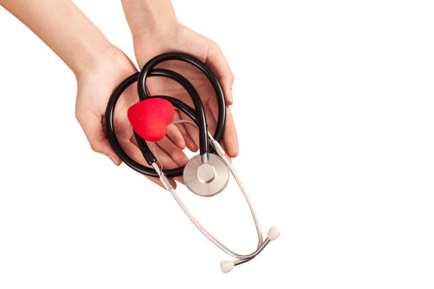 istock hands holding stethoscope and heart 1156546981