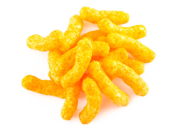 istock Orange Cheddar Cheese Puffs Isolated on a White Background 1156548920