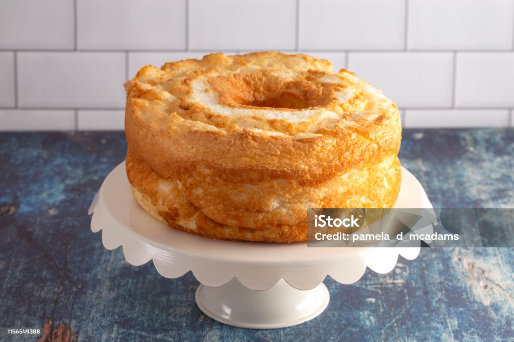 Angel Food Cake On a White Cake Stand Cake Stock Photo