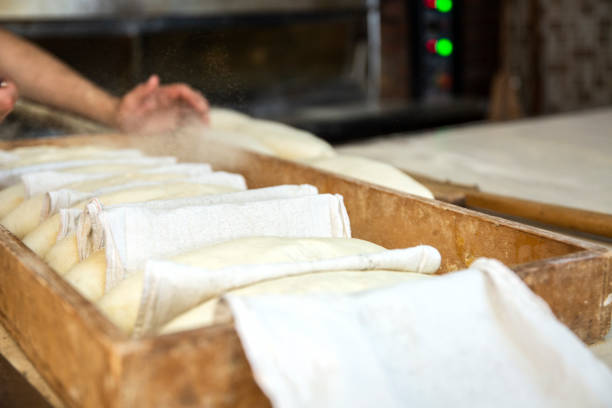 istock Fresh bread in bakery factory 1156550832