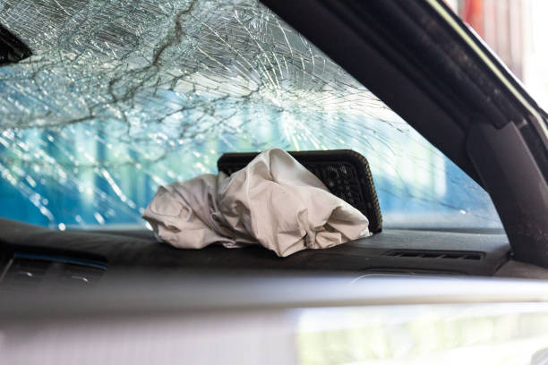 istock Deployed airbag in the interior of a vehicle 1156551054
