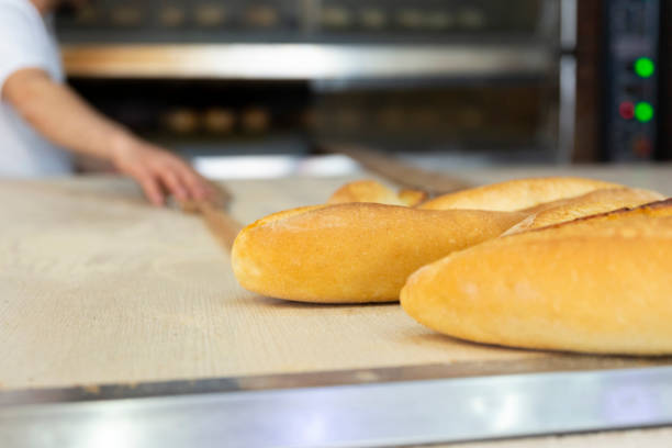 istock Turkish breads at the exit from the oven after cooking 1156551498