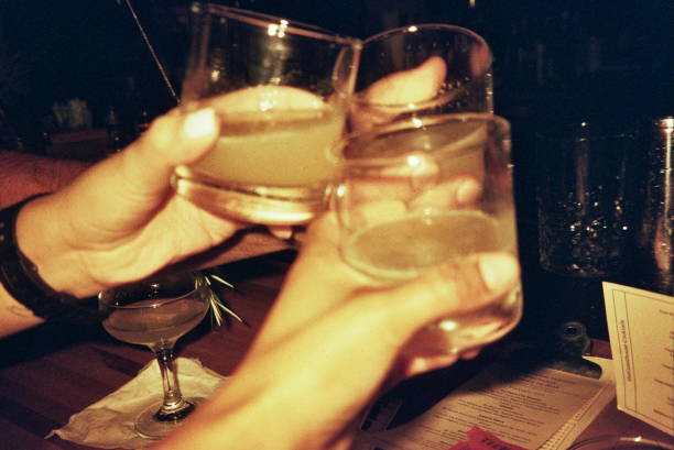 friends cheering with cocktails