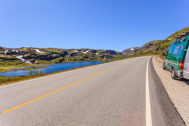 istock Camper car on road Norway 1156558826