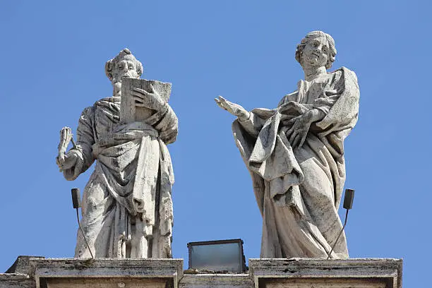 Vatican - Saint Ephraim and Saint Theodosia, sculpture by Andrea Baratta in the colonnade of famous Saint Peter's Square