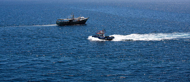 istock Pilot Boat and Fishing Boat 1156563131