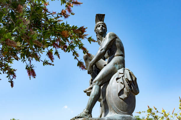 istock Statue of Theseus under blue sky 1156572614