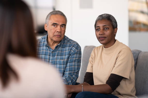 istock Elderly married couple at therapy 1156573554