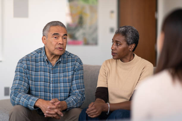 istock Elderly married couple at therapy 1156573556