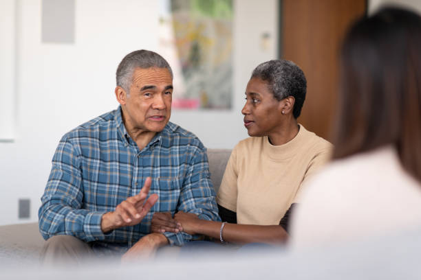 istock Elderly married couple at therapy 1156573563