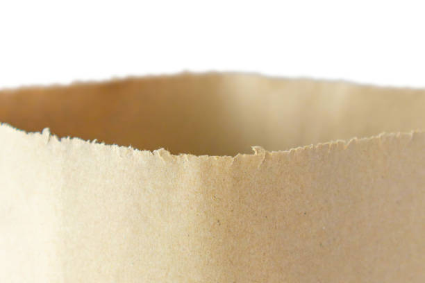 Empty brown recycle paper bag isolated on white background closeup