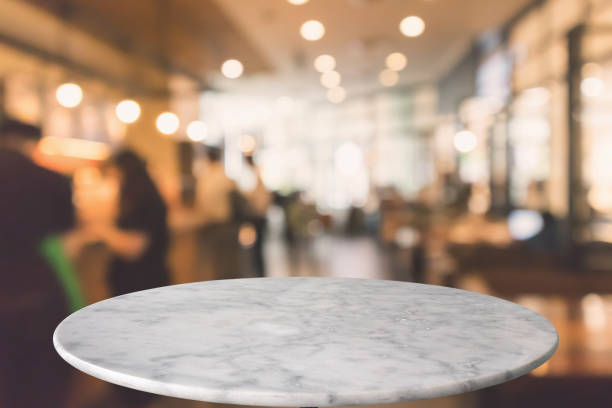 istock round marble table top with cafe restaurant bokeh lights abstract background for montage product display 1156575199