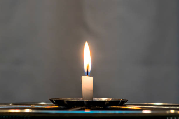 istock flame candle isolated in Brazil 1156583494