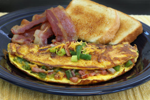 istock Western or Denver Omelet with toast and bacon. 1156600685