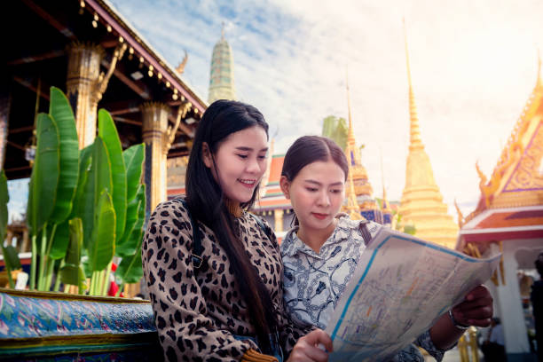 istock Young tourist traveling in Thai temple 1156601471