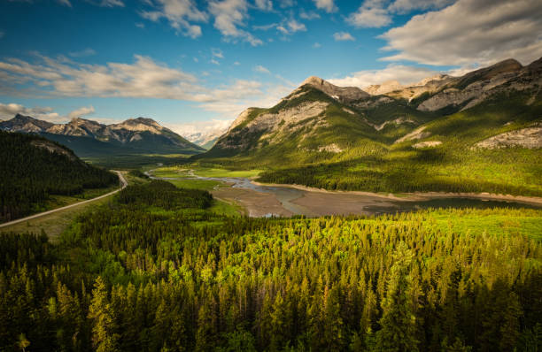 Kananaskis River with the Canadian Rockies located in  Kananaskis, Alberta.