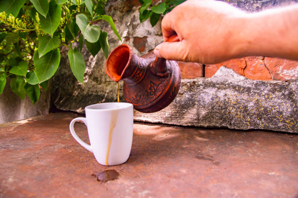 istock Clay Turk for coffee and a white cup on a brick wall background. 1156616819