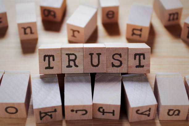istock Trust Word In Wooden Stamp Cube 1156619042