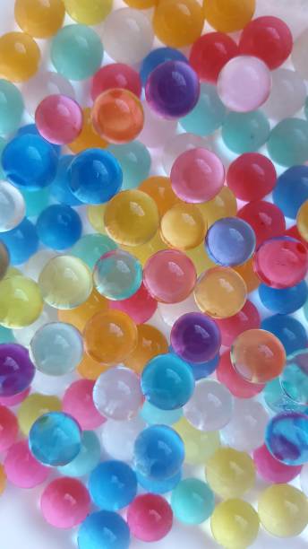 istock colored background, helium balloons, science 1156619858