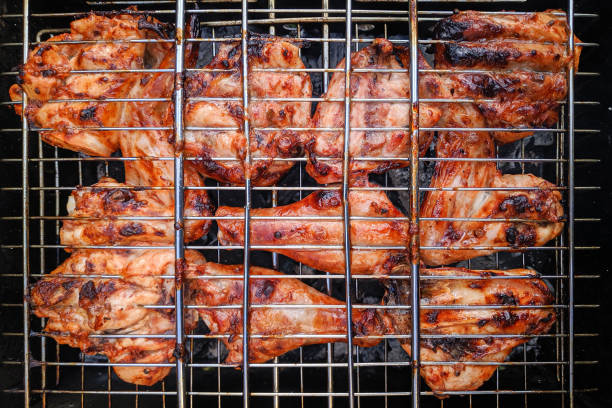 istock Chiken on the grill 1156624297