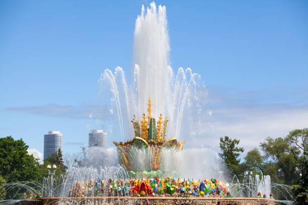 istock Fountain Stone Flower on summer sunny day on blue sky and clouds background, famous beautiful architectural landmark, Exhibition of Achievements of National Economy (VDNKh) in Moscow, Russia 1156624704