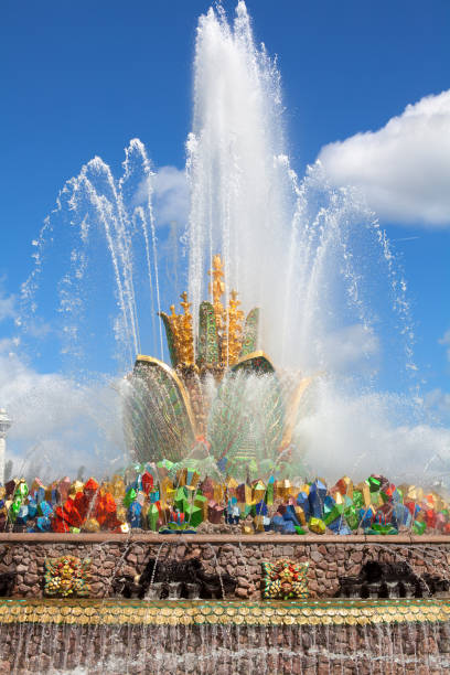 istock Fountain Stone Flower on summer sunny day on blue sky and clouds background, famous beautiful architectural landmark, Exhibition of Achievements of National Economy (VDNKh) in Moscow, Russia 1156624713
