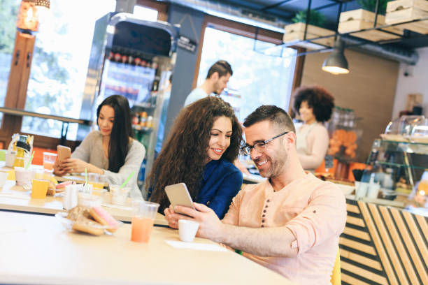 istock Couple enjoying time together in cafe 1156637083