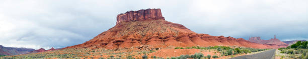 istock Old road stretches across the wild west red rock pinnacles 1156637283