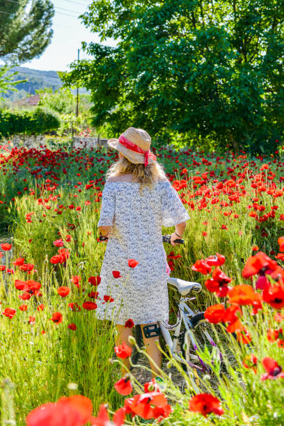 Woman in poppies.