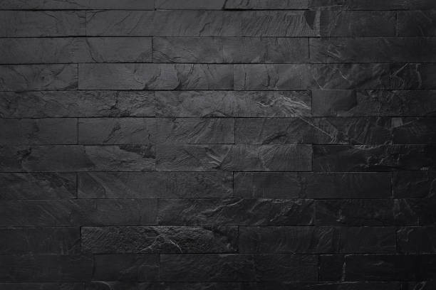 istock Dark grey black slate texture in natural pattern with high resolution for background and design art work. Black stone wall. 1156637685