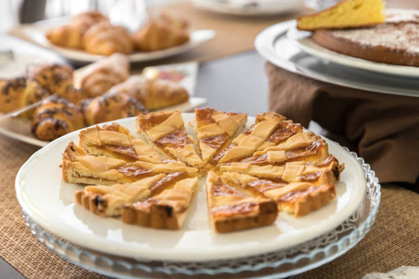 istock Breakfast buffet table with homemade cake and croissant 1156640311