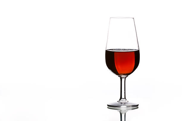 Glass of Spanish sherry on white background. stock photo
